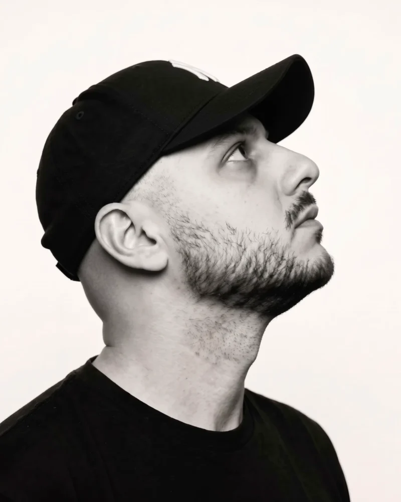 Matthew C. Levy, in profile, looking up